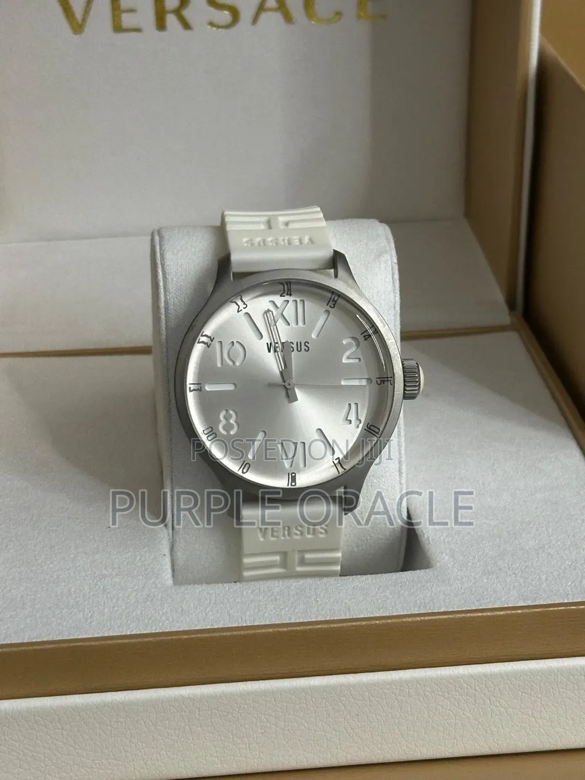 Versus Versace City Watch In A Silver Case And White Rubber Strap.