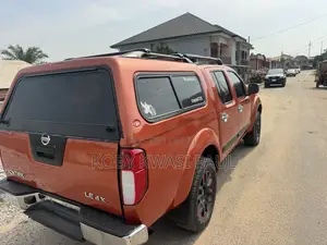 Nissan Frontier King Cab SE V6 2011 Brown