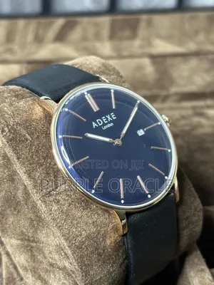 Adexe London Grande Watch With A Black Dial And A Rose Gold-tone .