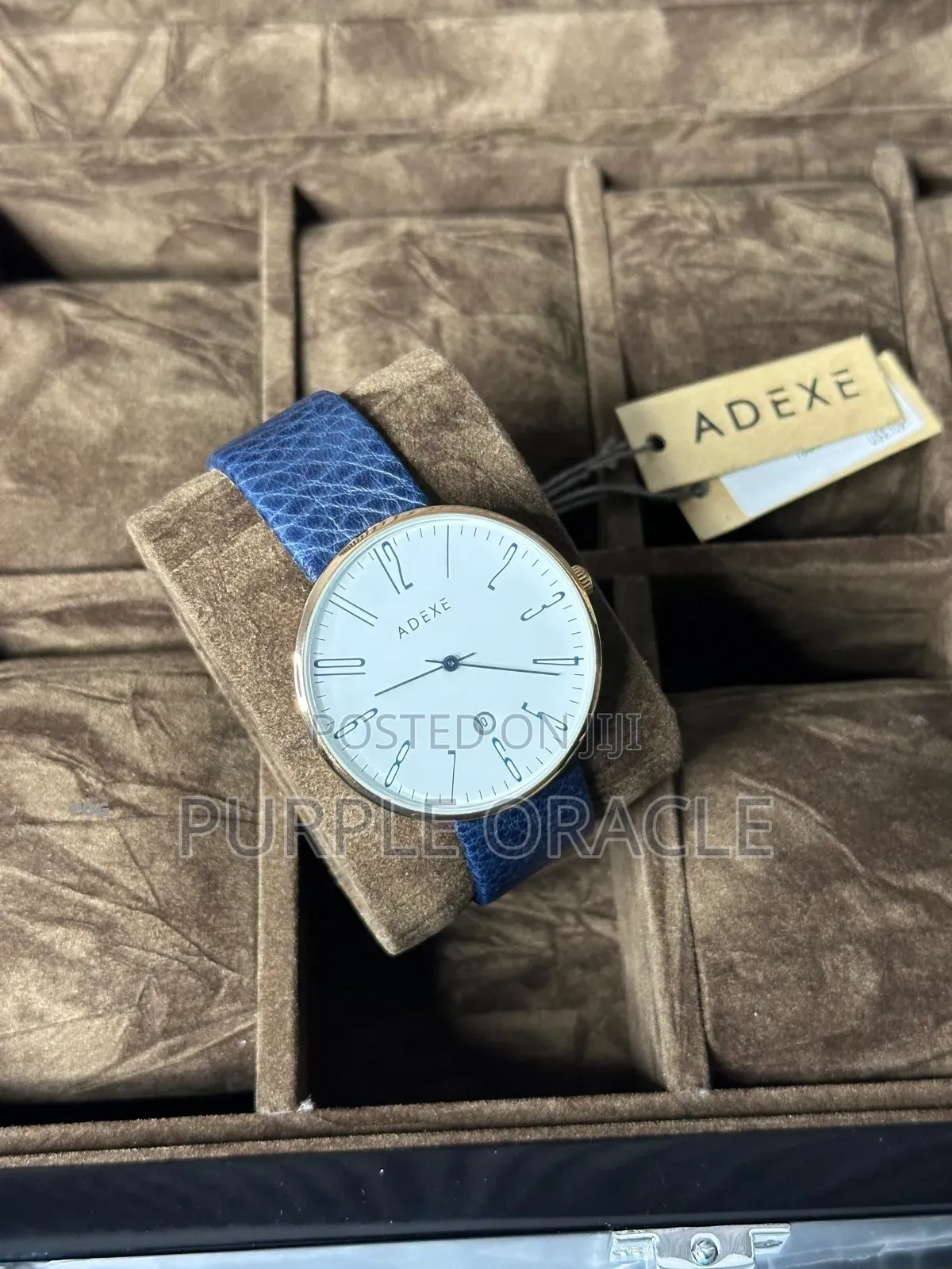 Adexe London Grande Watch With A Black Dial And A Rose Gold-tone .