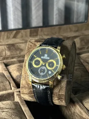 Gold-tone Binger Men's Watch With A Black Leather Strap.