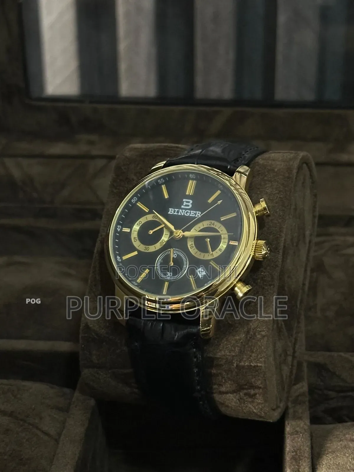 Gold-tone Binger Men's Watch With A Black Leather Strap.