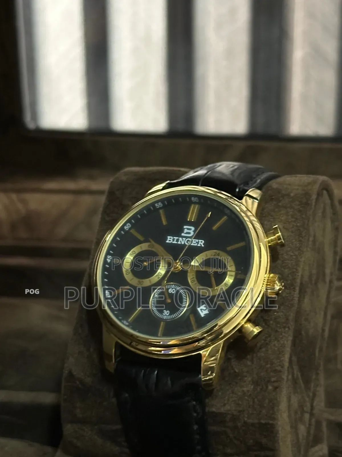 Gold-tone Binger Men's Watch With A Black Leather Strap.
