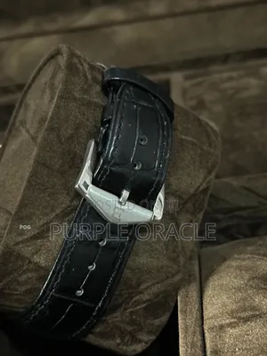 Gold-tone Binger Men's Watch With A Black Leather Strap.