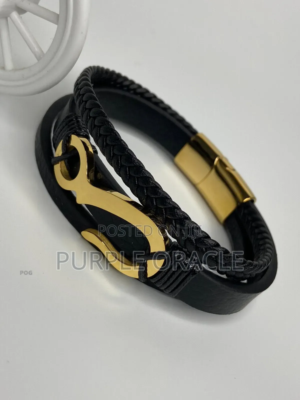 Men's Black Leather And Gold-plated Bracelet.