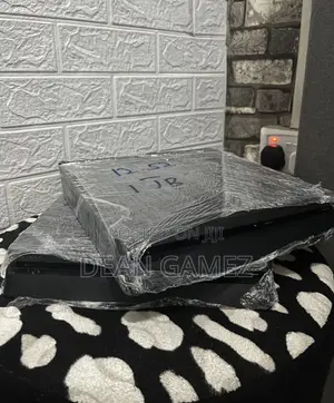 Ps4 Slim With Fc 26, Gta 5 and More Games With Accessories