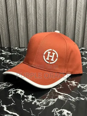 Orange And White Hermès Baseball Cap With An Embroidered H Logo