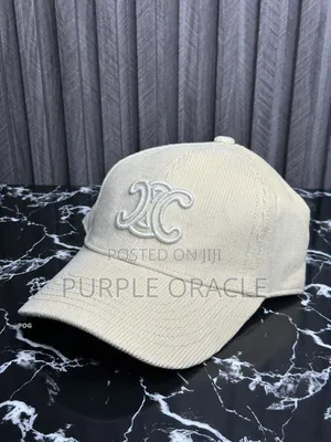 Celine Baseball Cap in a Cream Color.