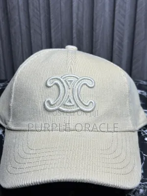 Celine Baseball Cap in a Cream Color.