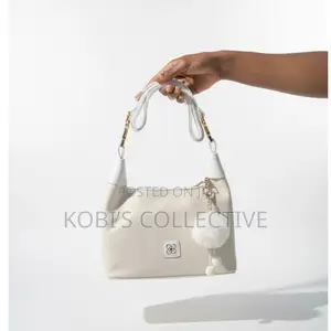 Cream Textured Hobo Bag With White Pom-Pom Charm