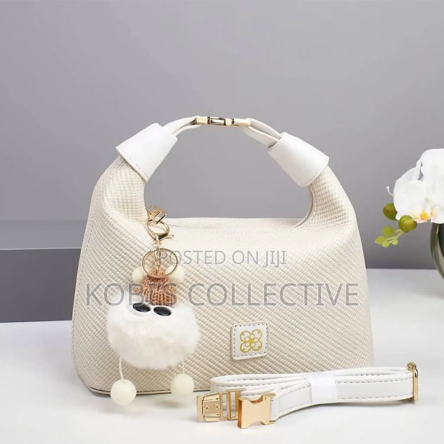 Cream Textured Hobo Bag With White Pom-Pom Charm