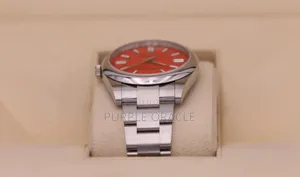 Rolex Oyster Perpetual 41mm Silver Coral Red Dial Watch