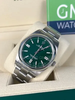 Rolex Oyster Perpetual 41mm Silver Green Dial Watch