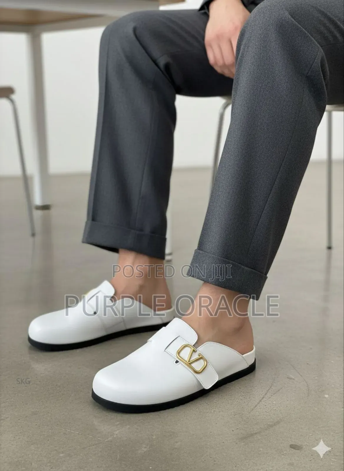 Valentino Garavani Black And White Slip-on Half Shoes