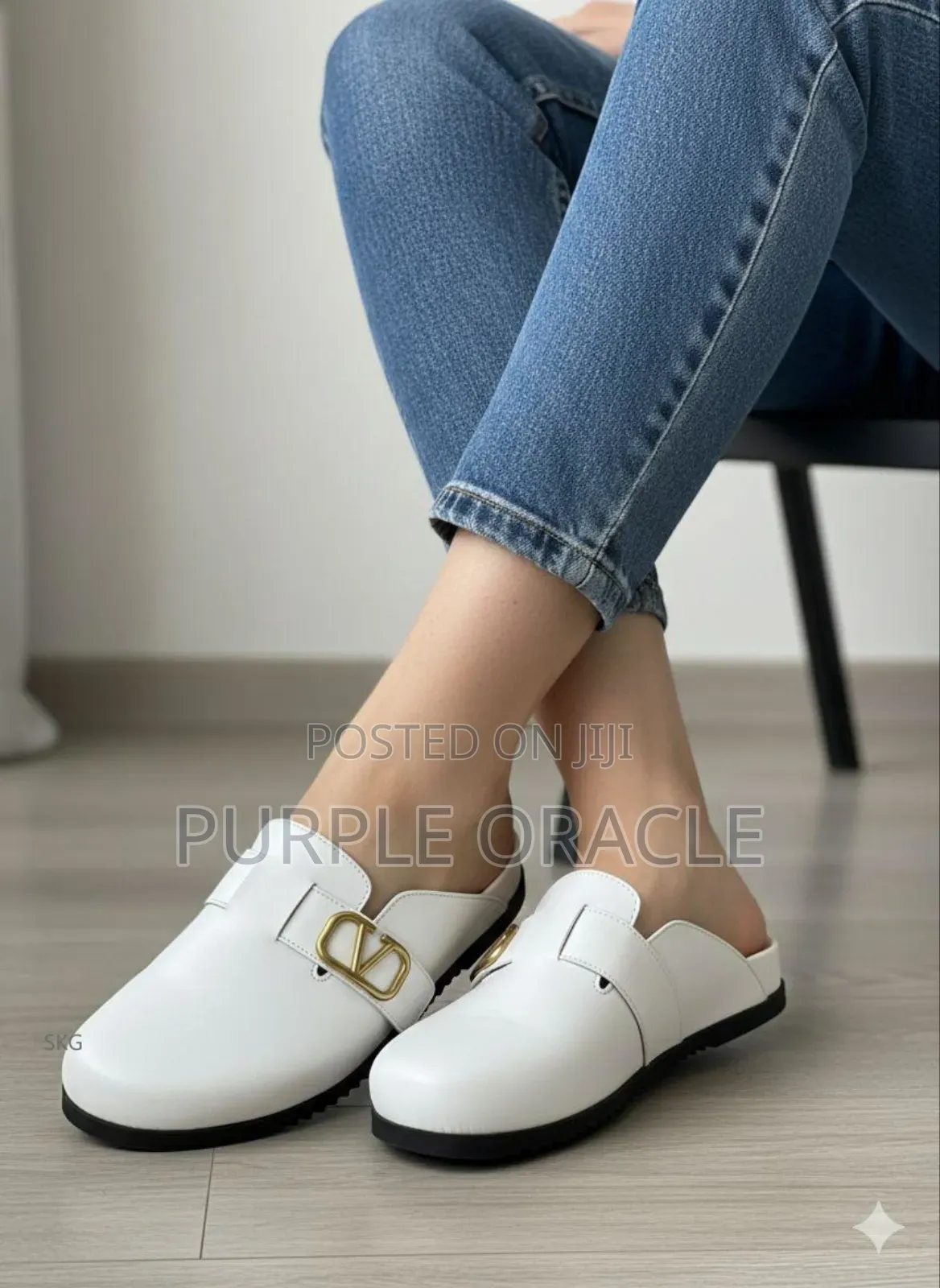 Valentino Garavani Black And White Slip-on Half Shoes