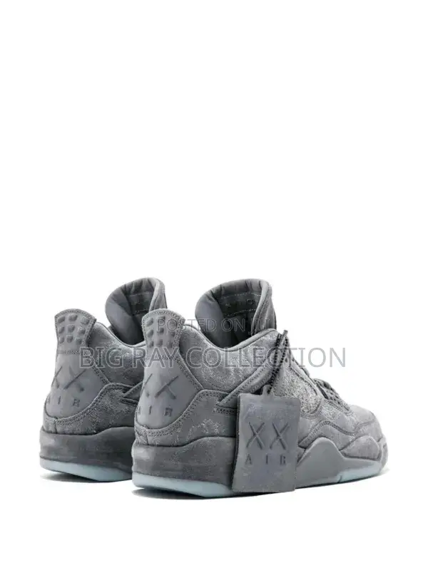 X Kaws Air Jordan 4 Retro Sneakers