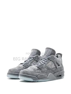X Kaws Air Jordan 4 Retro Sneakers