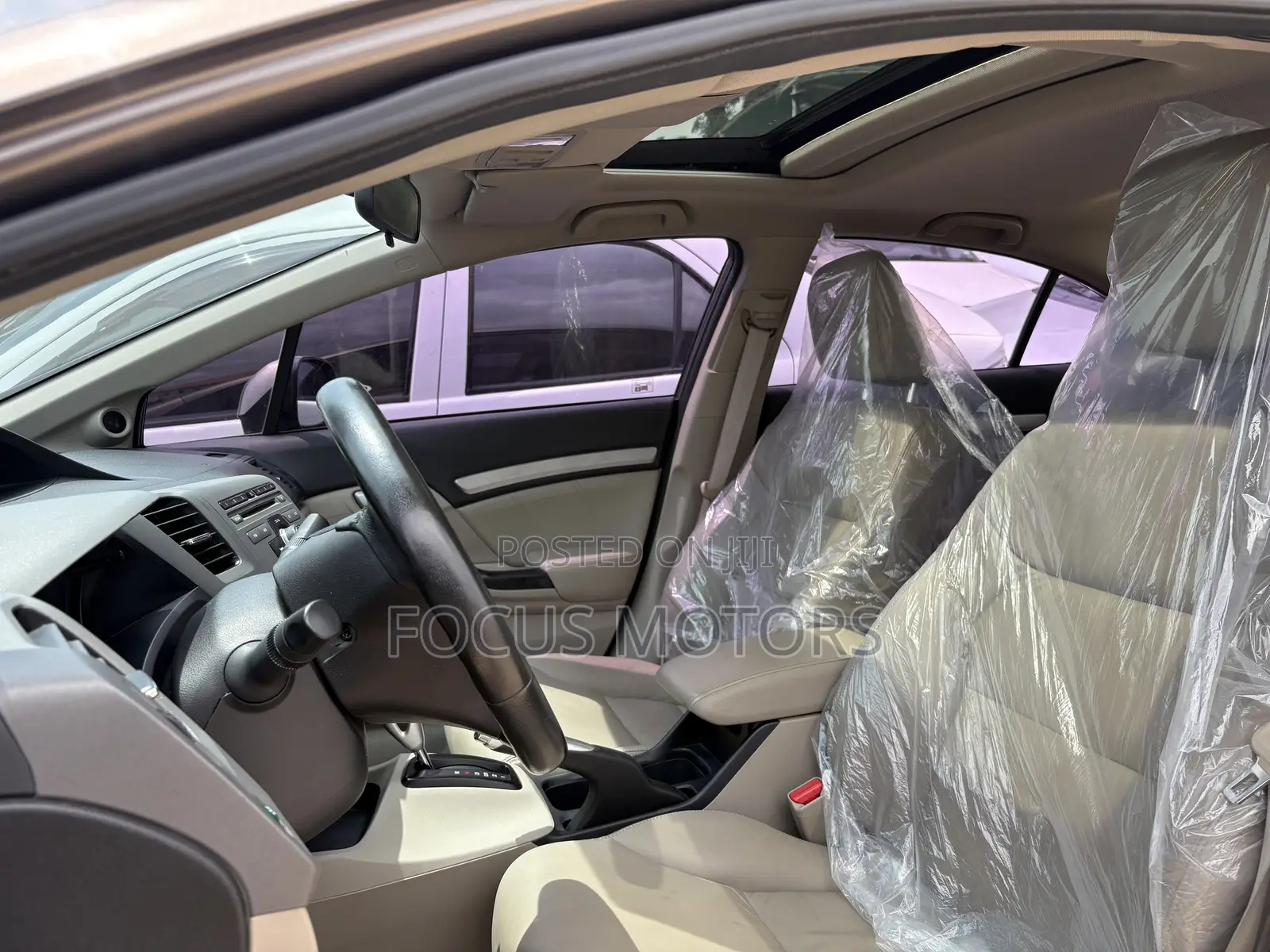 Honda Civic EX-L 2dr Coupe (1.8L 4cyl CVT) 2014 Gold