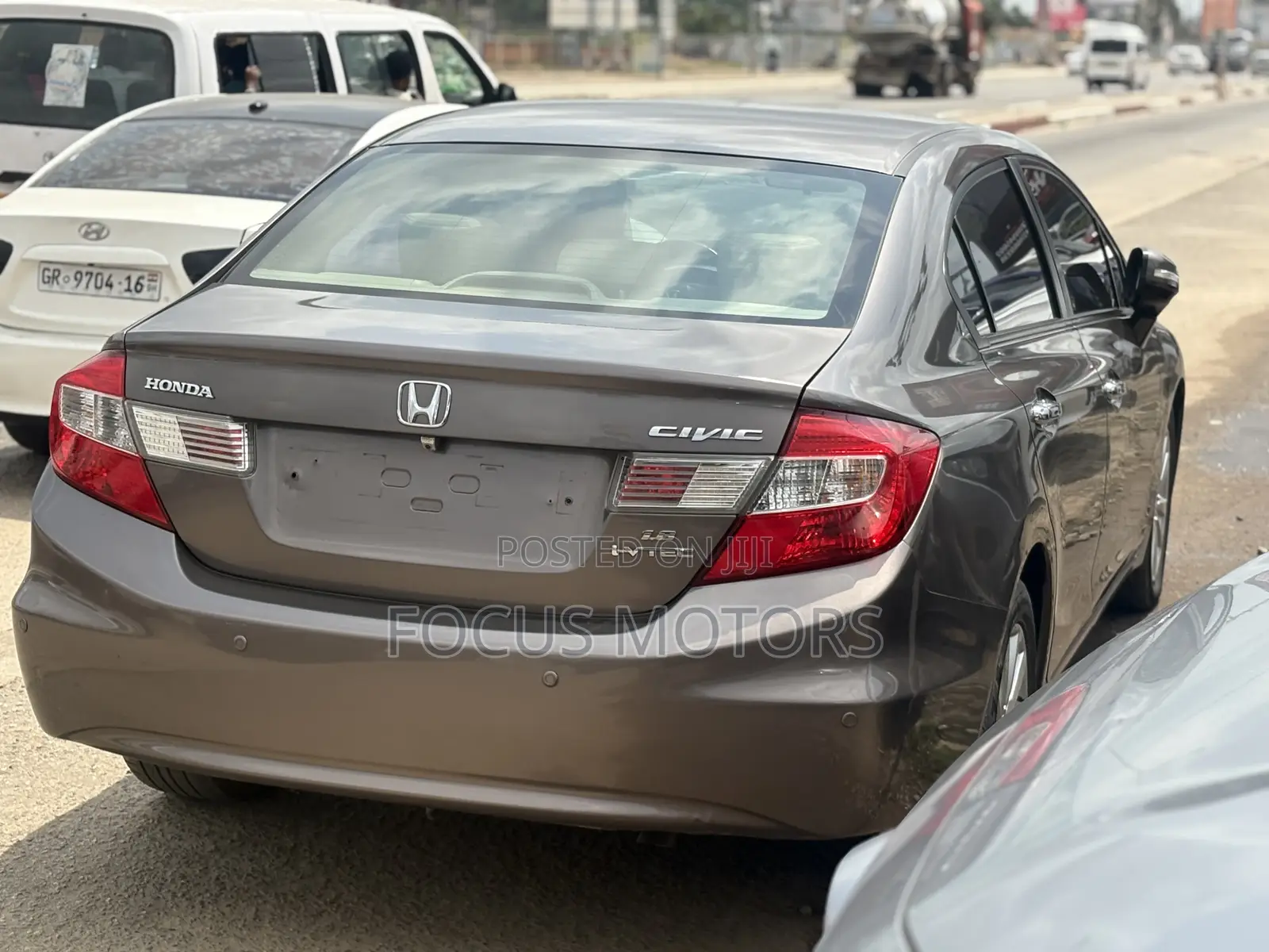 Honda Civic EX-L 2dr Coupe (1.8L 4cyl CVT) 2014 Gold