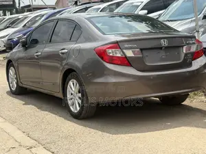 Honda Civic EX-L 2dr Coupe (1.8L 4cyl CVT) 2014 Gold