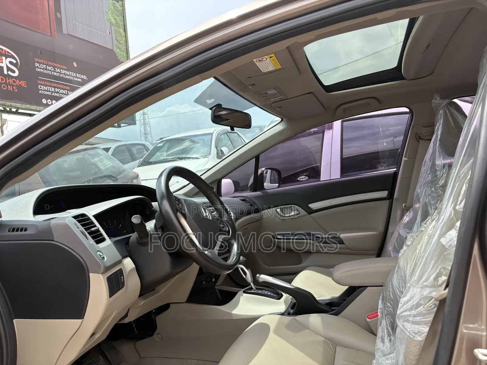 Honda Civic EX-L 2dr Coupe (1.8L 4cyl CVT) 2014 Gold