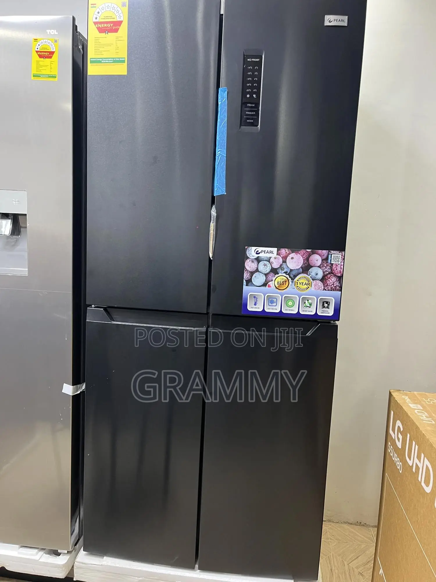 Side-by-Side Upper Doors With Bottom Freezer Drawers