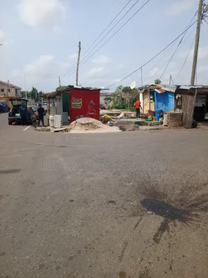 Main Road Almost Half Plot at Anyaa, Accra