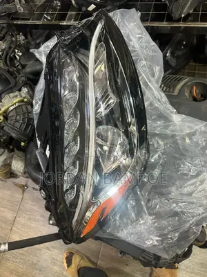 Brand New C300 Headlight Pair With Charger Complete