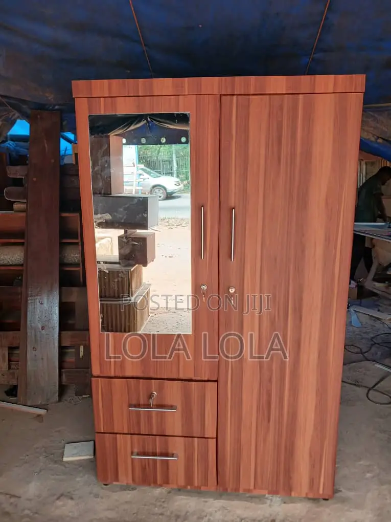 A 2-Door Wardrobe With Mirror and 2 Lower Drawers