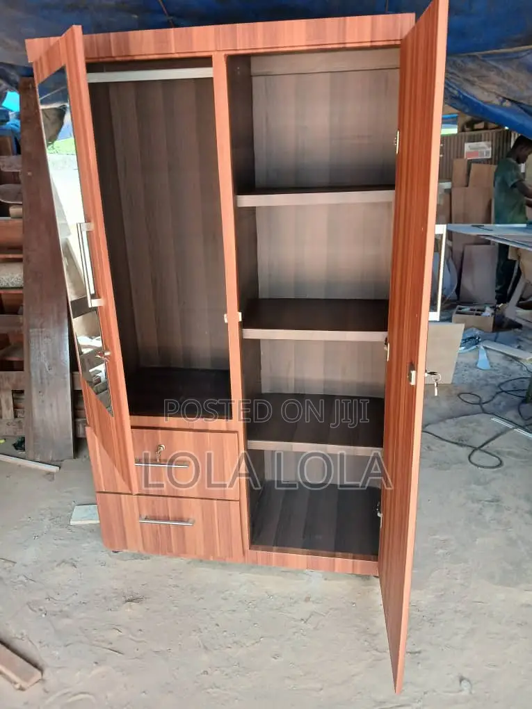 A 2-Door Wardrobe With Mirror and 2 Lower Drawers