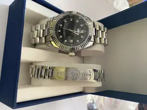 Silver Rolex and Bracelet