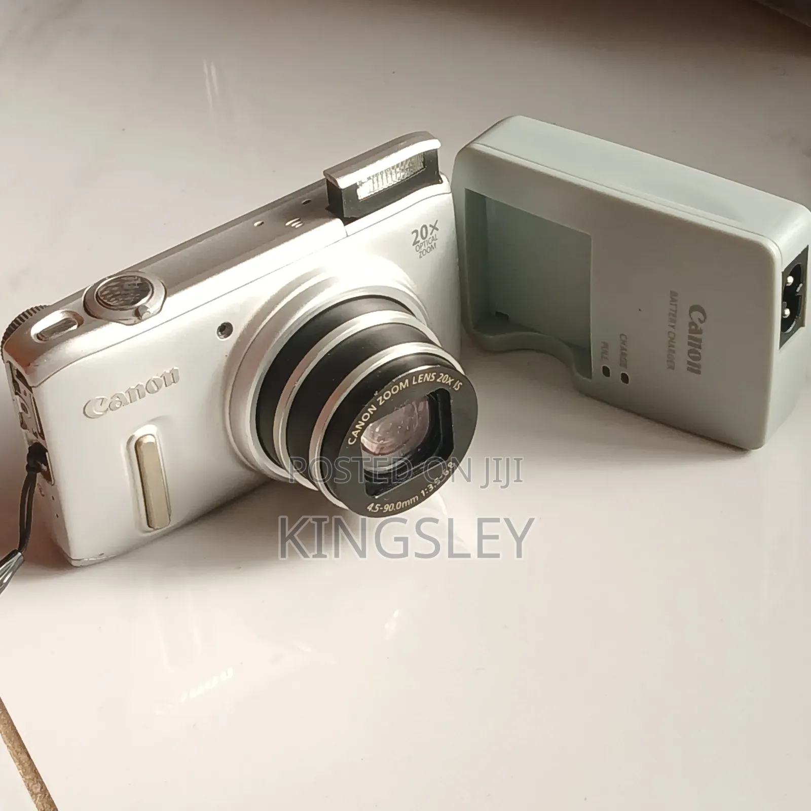 Digital Camera(Canon) Plus Free Charger and Memory Card.