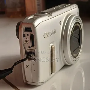 Digital Camera(Canon) Plus Free Charger and Memory Card.