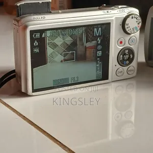 Digital Camera(Canon) Plus Free Charger and Memory Card.