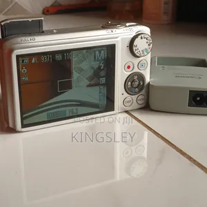 Digital Camera(Canon) Plus Free Charger and Memory Card.