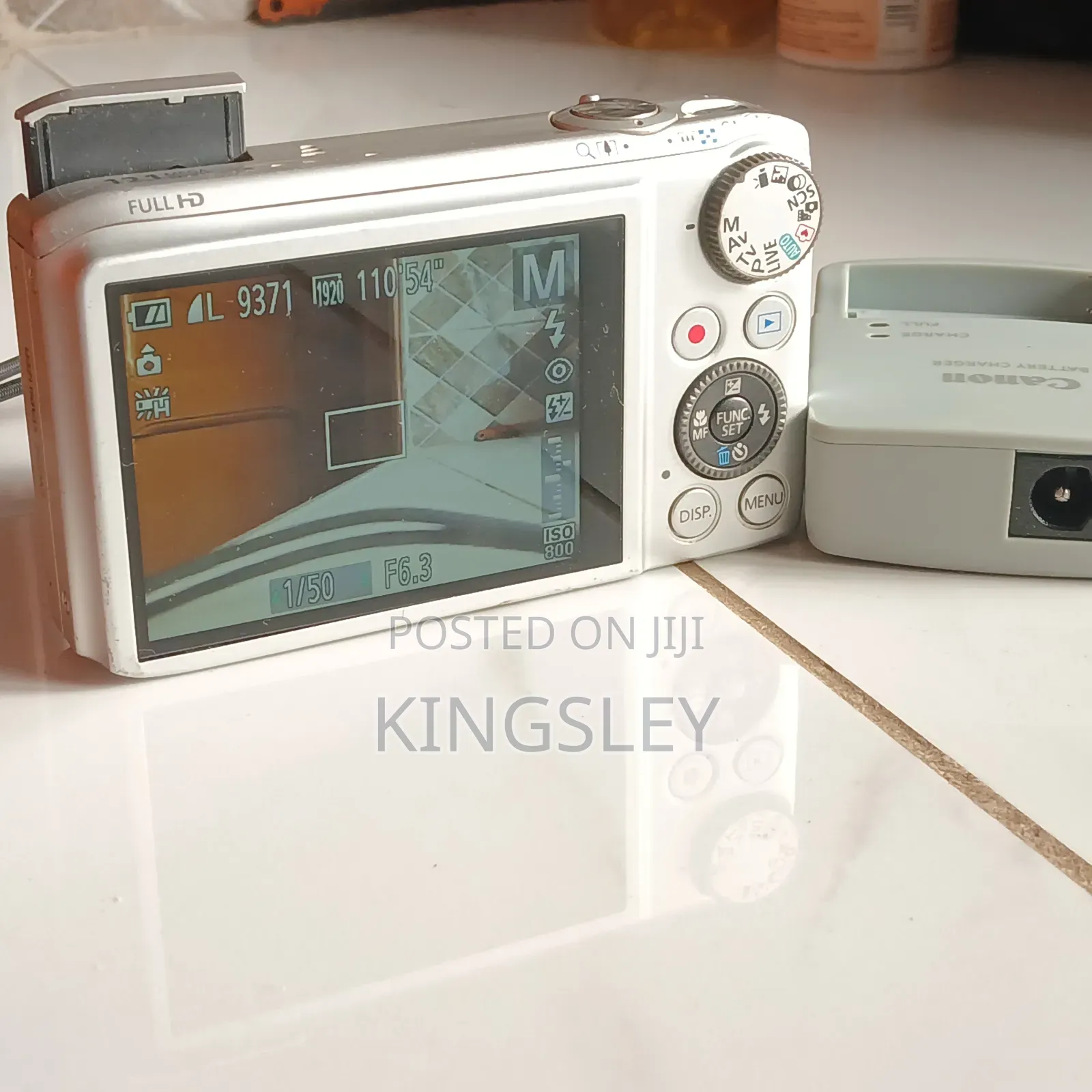 Digital Camera(Canon) Plus Free Charger and Memory Card.