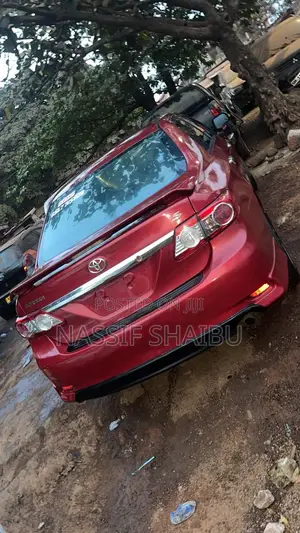 Toyota Corolla L 4dr Sedan (1.8L 4cyl 5M) 2013 Red
