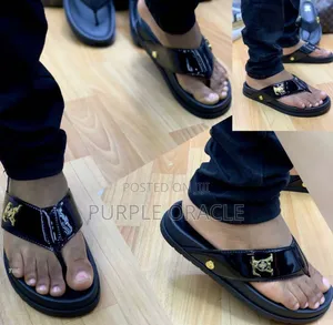 Black Louis Vuitton Men's Palm Slippers.