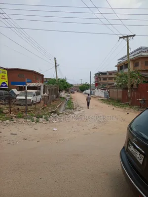 Titled Plot at Nyamekye Traffic Light Area Near , Accra