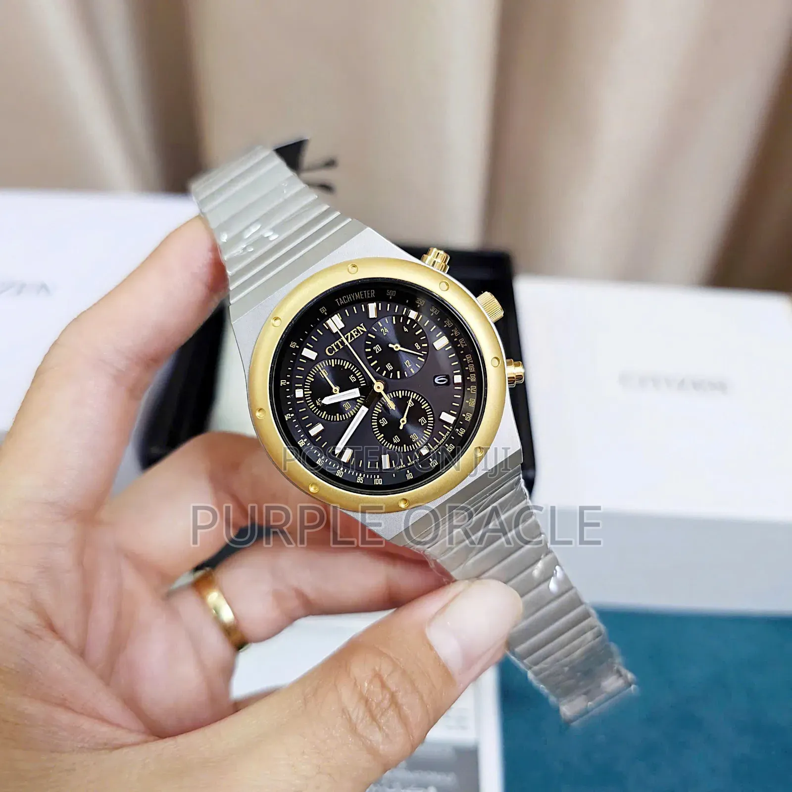 Citizen At2544-64e Quartz Eco-drive Chronograph Tachymeter.