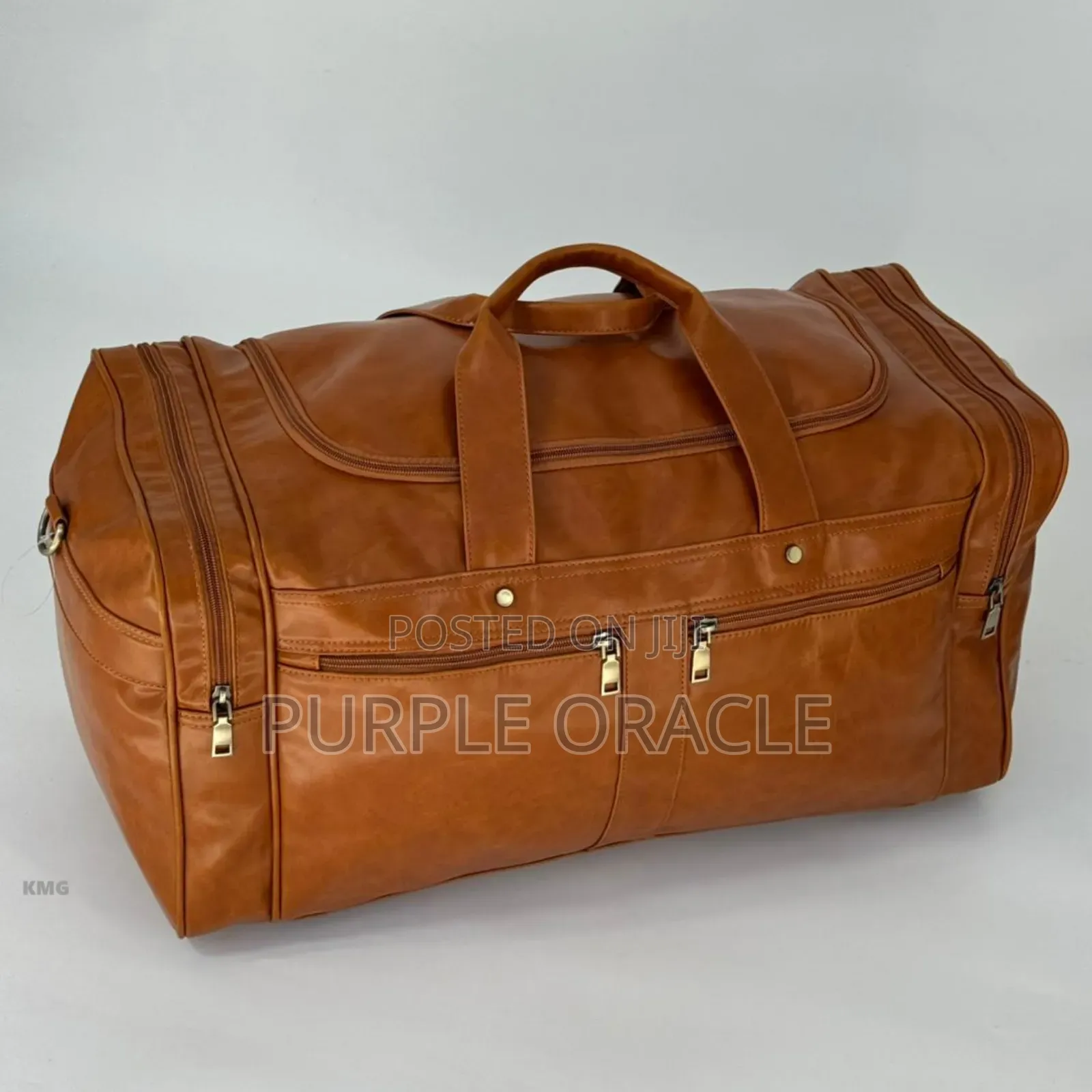 Brown And Black Leather Duffle Bag