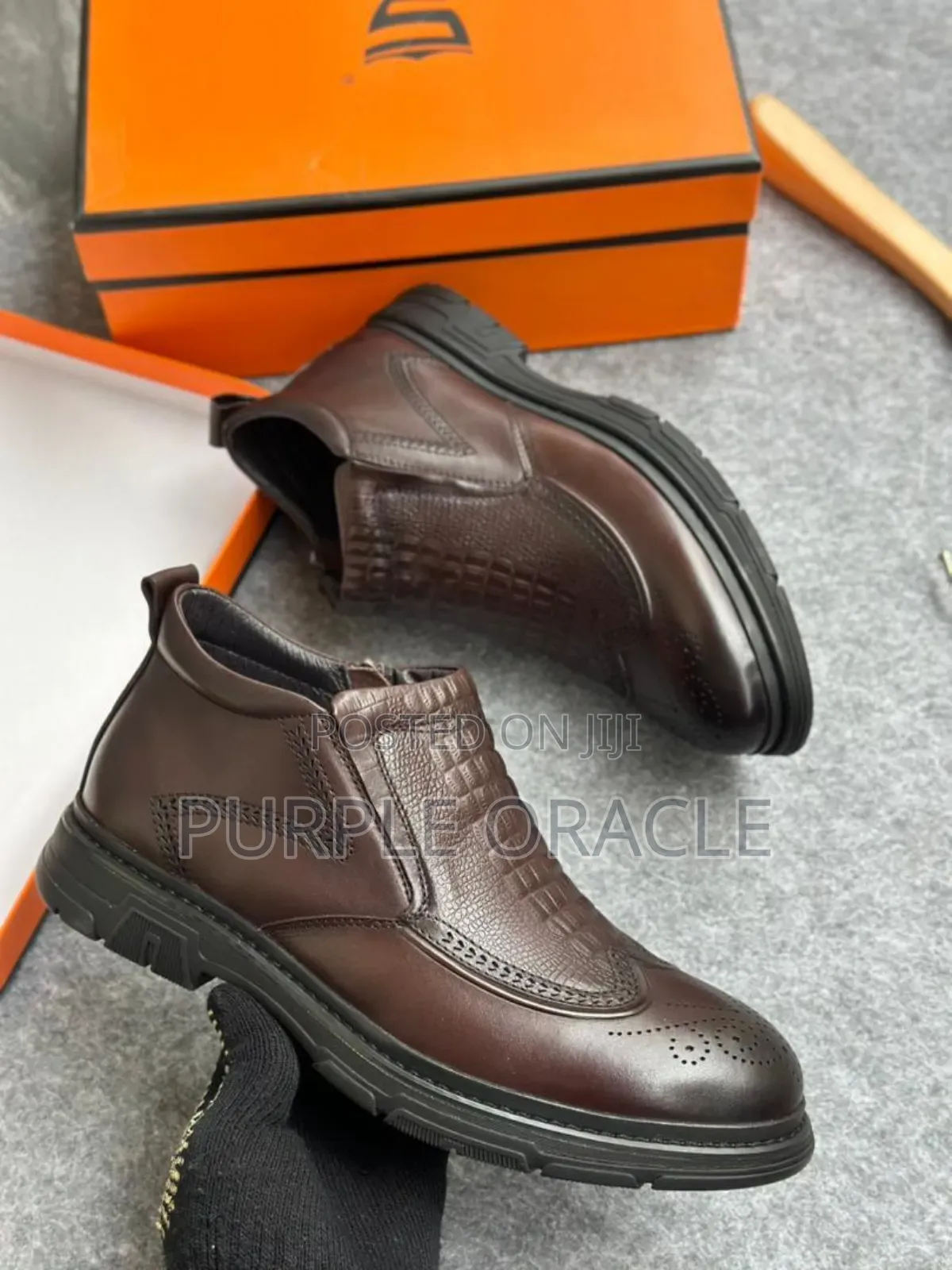 Men's Black Leather Ankle Boots With Double-sided Zipper Closure.