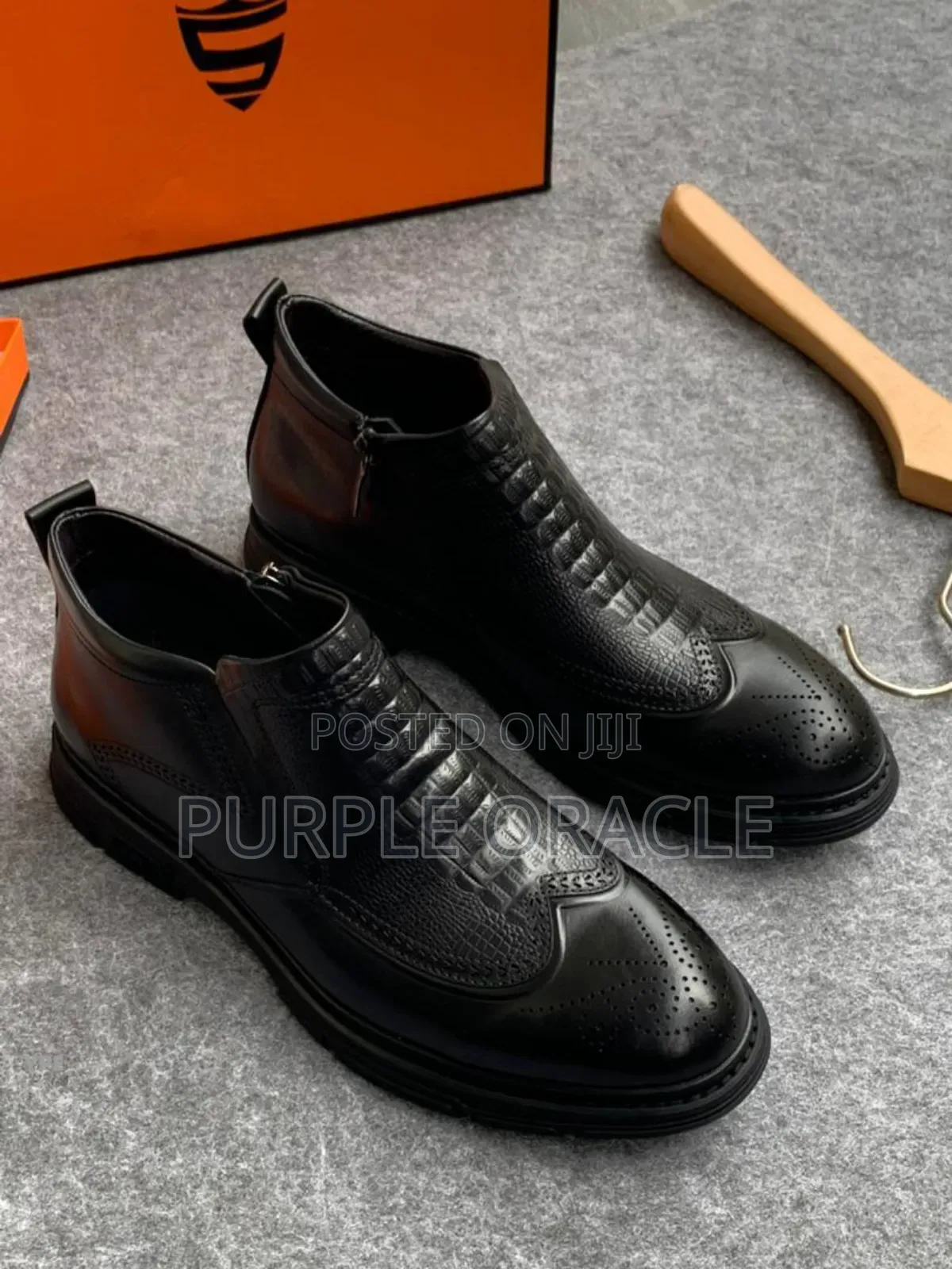 Men's Black Leather Ankle Boots With Double-sided Zipper Closure.