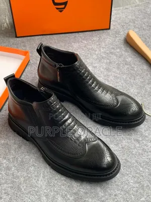 Men's Black Leather Ankle Boots With Double-sided Zipper Closure.