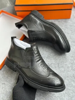 Men's Black Leather Ankle Boots With Double-sided Zipper Closure.