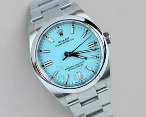 Rolex Oyster Perpetual Men's Steel Dome Bezel Blue Dial Watch.