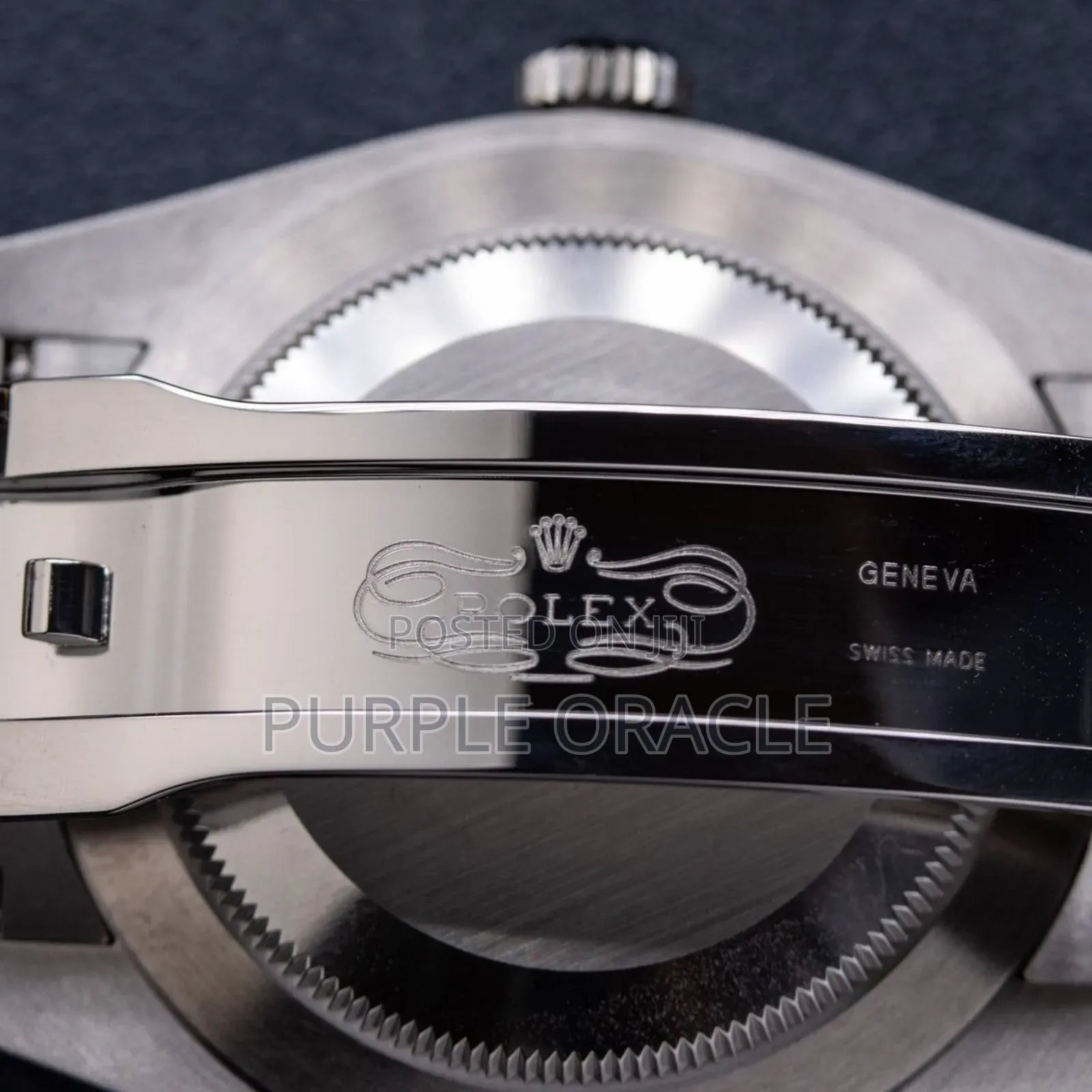 Rolex Oyster Perpetual Men's Steel Dome Bezel Blue Dial Watch.
