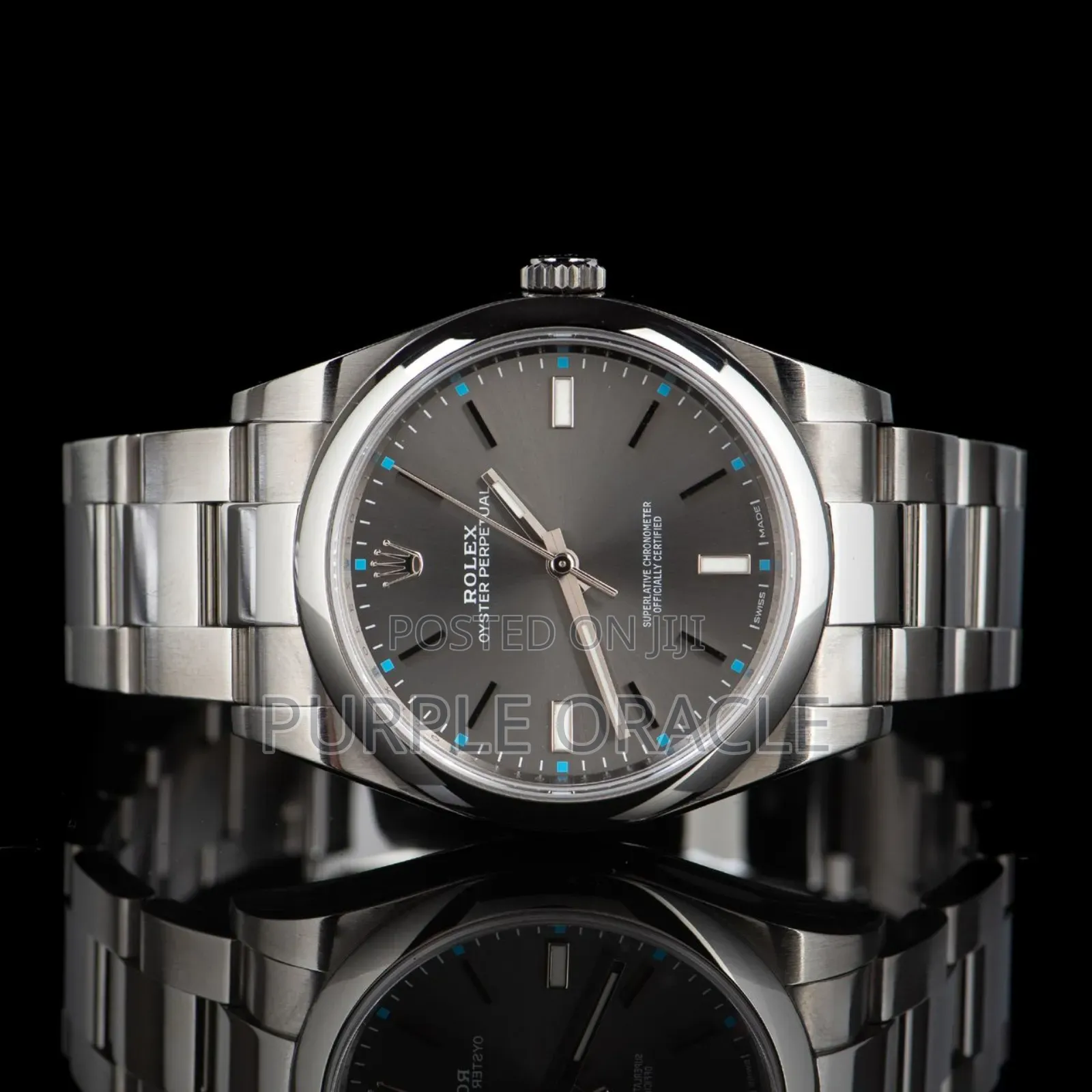 Rolex Oyster Perpetual Men's Steel Dome Bezel Watch Grey Dial.