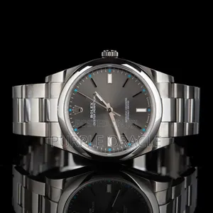 Rolex Oyster Perpetual Men's Steel Dome Bezel Watch Grey Dial.