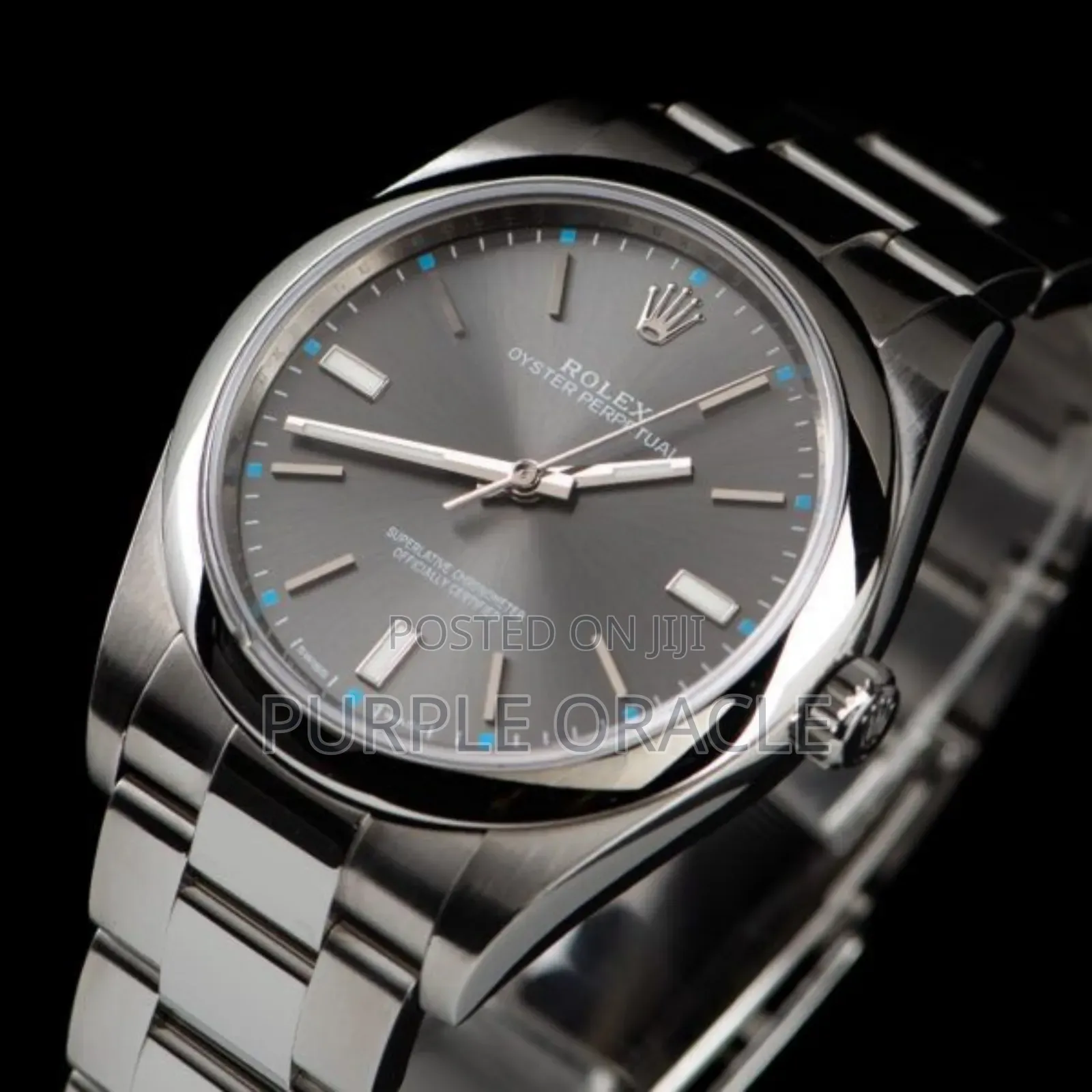 Rolex Oyster Perpetual Men's Steel Dome Bezel Watch Grey Dial.